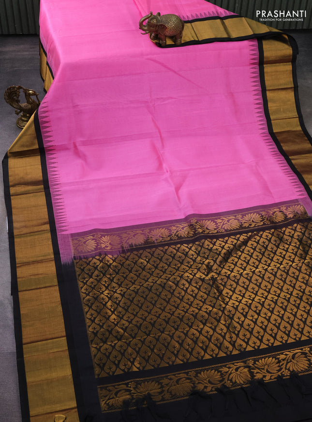 Kuppadam silk cotton saree light pink and black with plain body and temple design zari woven border