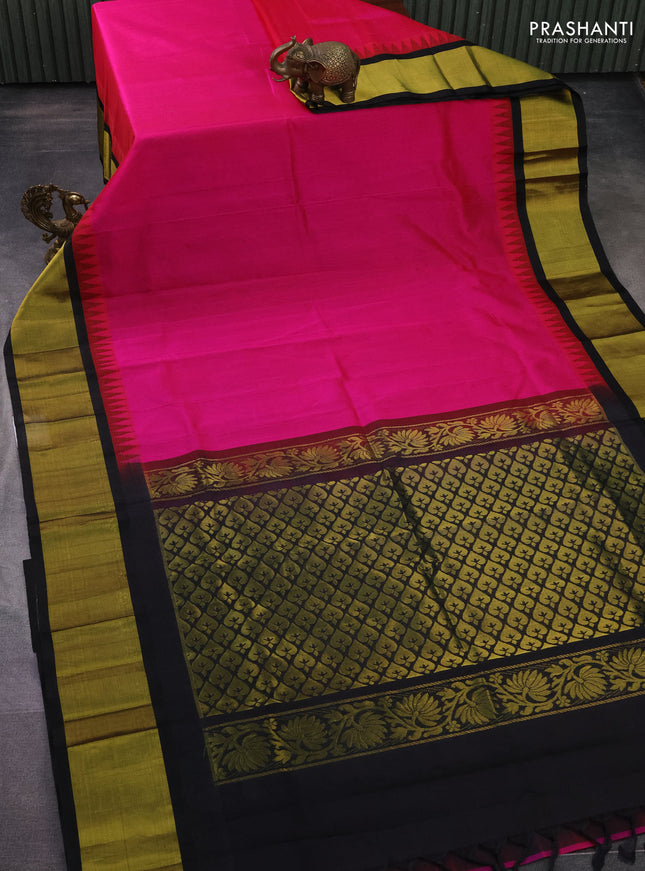 Kuppadam silk cotton saree magenta pink and black with plain body and temple design zari woven border