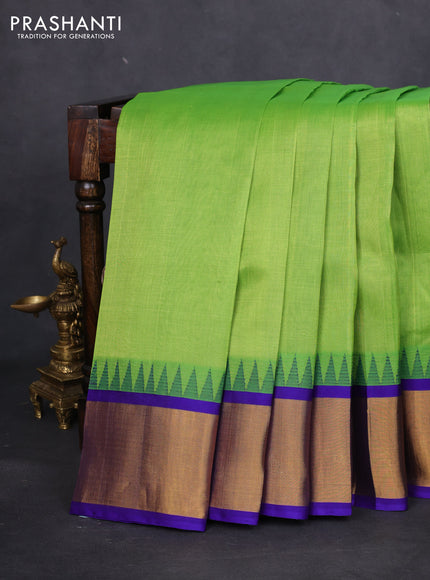 Kuppadam silk cotton saree light green and blue with plain body and temple design zari woven border