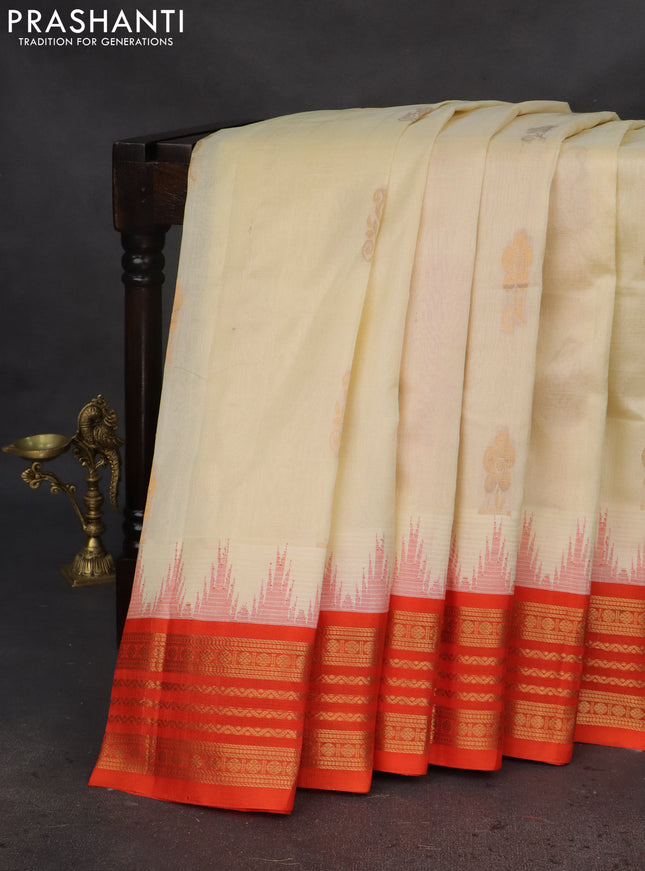 Kuppadam silk cotton saree cream and orange with zari woven buttas and temple design zari woven border
