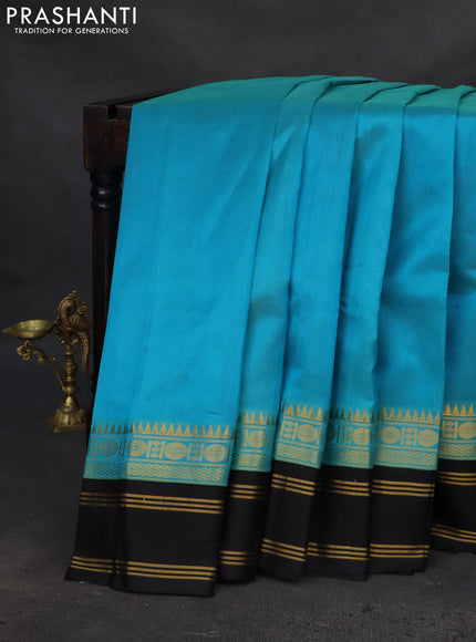 Kuppadam silk cotton saree teal blue and black with plain body and rettapet zari woven border