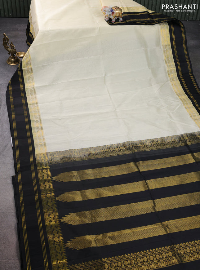 Kuppadam silk cotton saree cream and black with plain body and rettapet zari woven border