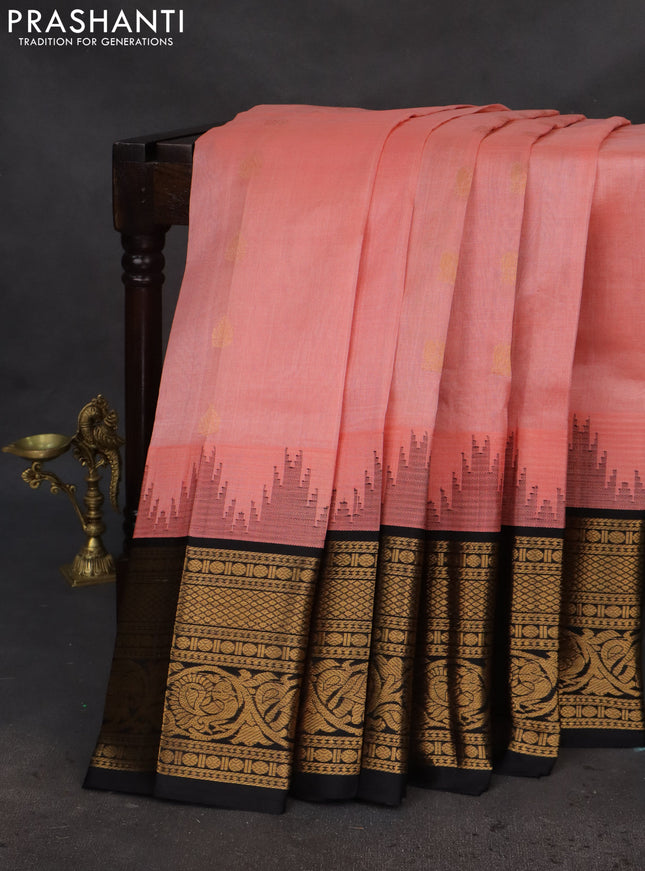 Kuppadam silk cotton saree peach pink and black with zari woven buttas and temple design long zari woven border