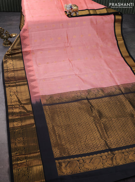 Kuppadam silk cotton saree peach pink and black with zari woven buttas and temple design long zari woven border