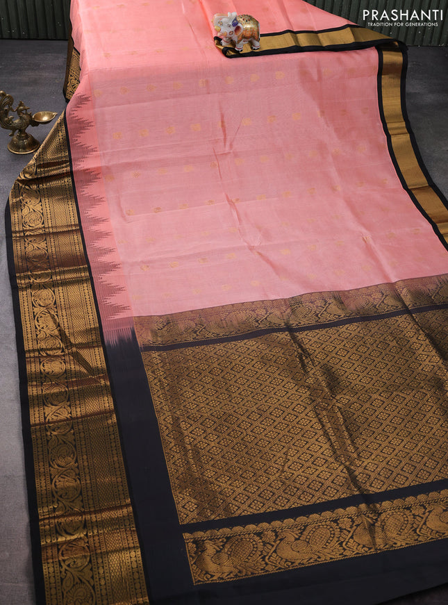 Kuppadam silk cotton saree peach pink and black with zari woven buttas and temple design long zari woven border