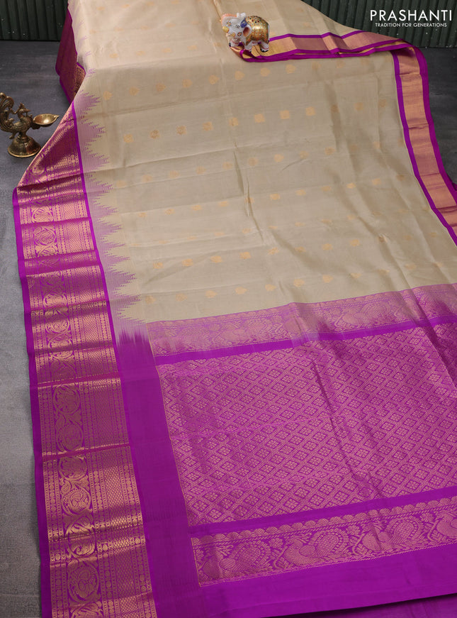 Kuppadam silk cotton saree beige and purple with zari woven buttas and temple design long zari woven border