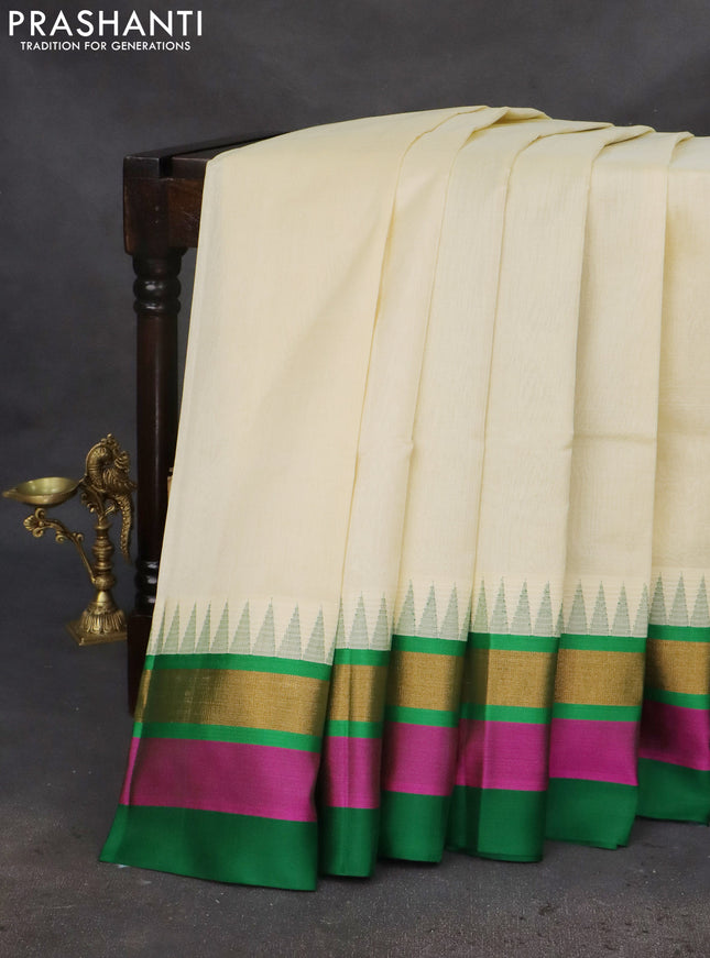 Kuppadam silk cotton saree cream and green with plain body and temple design zari woven simple border