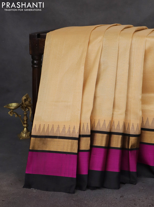Kuppadam silk cotton saree sandal and black with plain body and temple design zari woven simple border