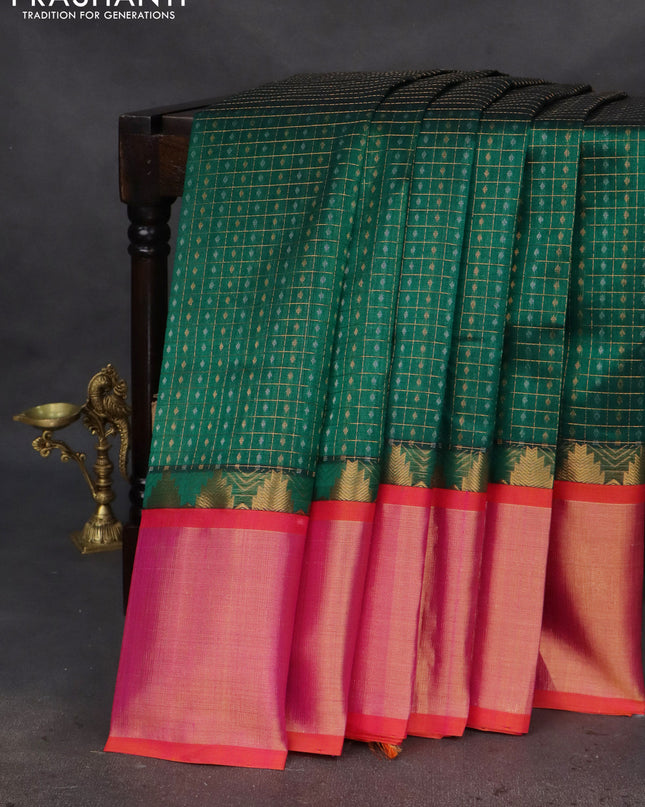Kuppadam silk cotton saree green and dual shade of pinkish orange with allover small zari checks & lakshadeepam weaves and temple design long zari woven border