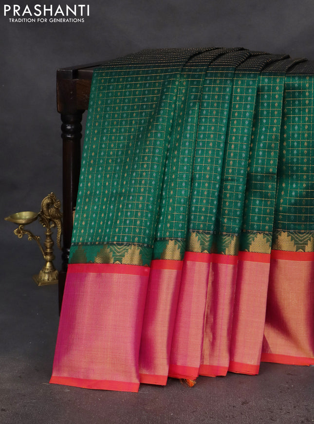 Kuppadam silk cotton saree green and dual shade of pinkish orange with allover small zari checks & lakshadeepam weaves and temple design long zari woven border
