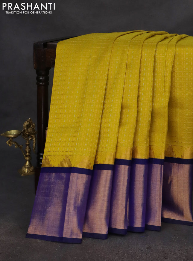 Kuppadam silk cotton saree lime yellow and blue with allover small zari checks & lakshadeepam weaves and temple design long zari woven border