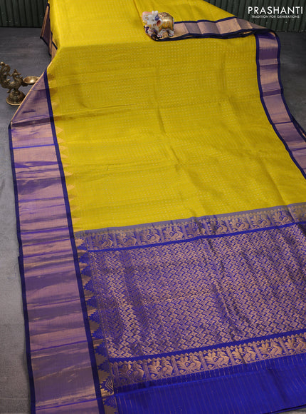 Kuppadam silk cotton saree lime yellow and blue with allover small zari checks & lakshadeepam weaves and temple design long zari woven border
