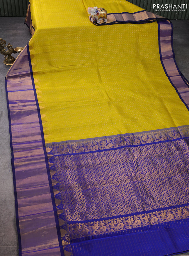 Kuppadam silk cotton saree lime yellow and blue with allover small zari checks & lakshadeepam weaves and temple design long zari woven border