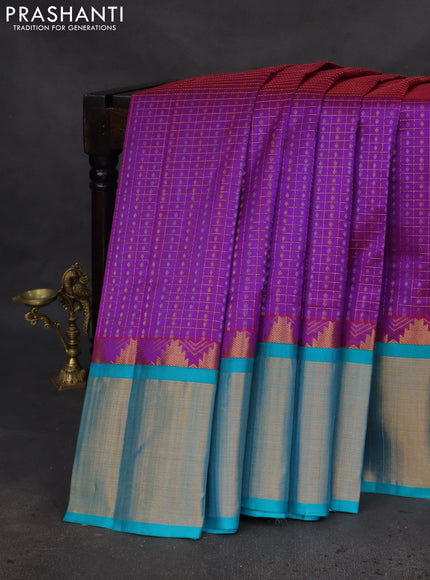 Kuppadam silk cotton saree purple and teal blue with allover small zari checks & lakshadeepam weaves and temple design long zari woven border