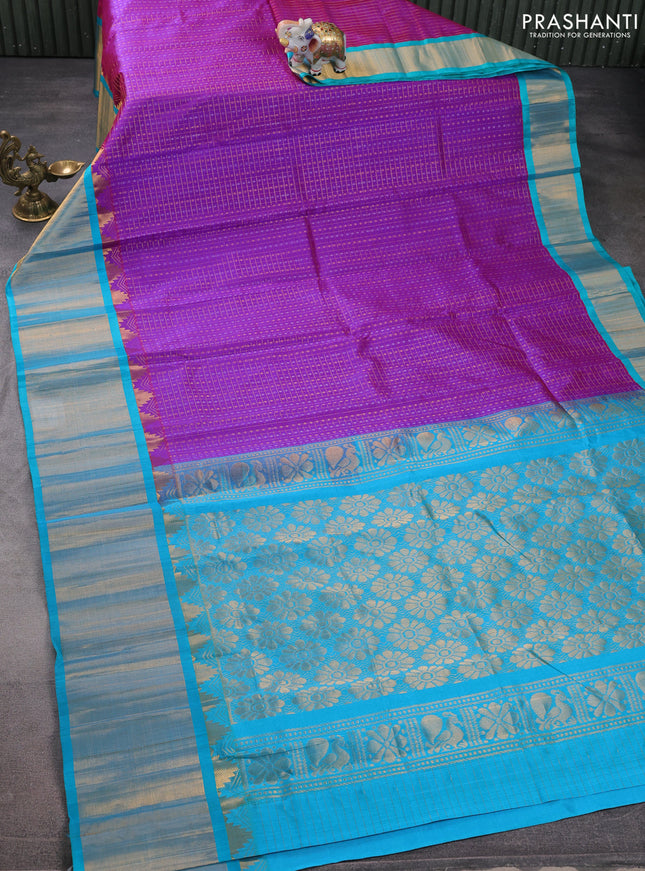 Kuppadam silk cotton saree purple and teal blue with allover small zari checks & lakshadeepam weaves and temple design long zari woven border
