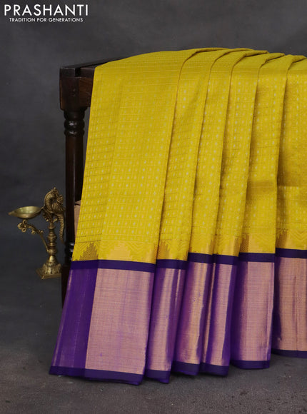 Kuppadam silk cotton saree lime yellow and blue with allover small zari checks & lakshadeepam weaves and temple design long zari woven border