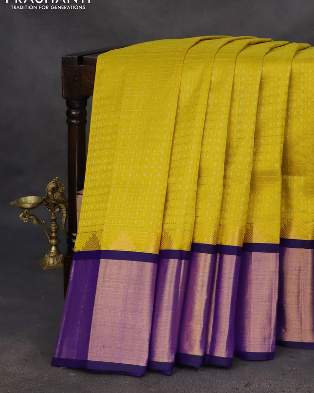 Kuppadam silk cotton saree lime yellow and blue with allover small zari checks & lakshadeepam weaves and temple design long zari woven border