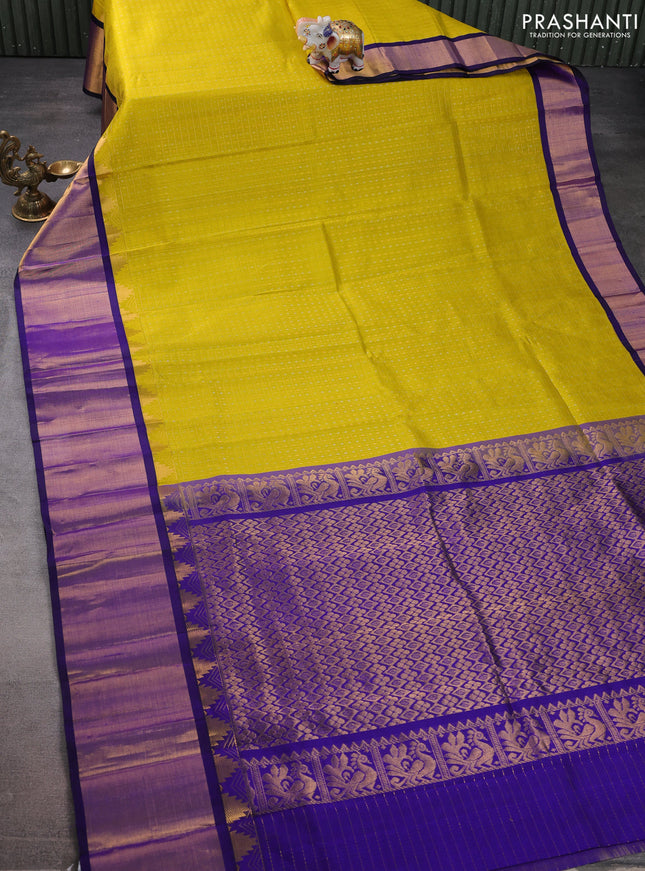 Kuppadam silk cotton saree lime yellow and blue with allover small zari checks & lakshadeepam weaves and temple design long zari woven border