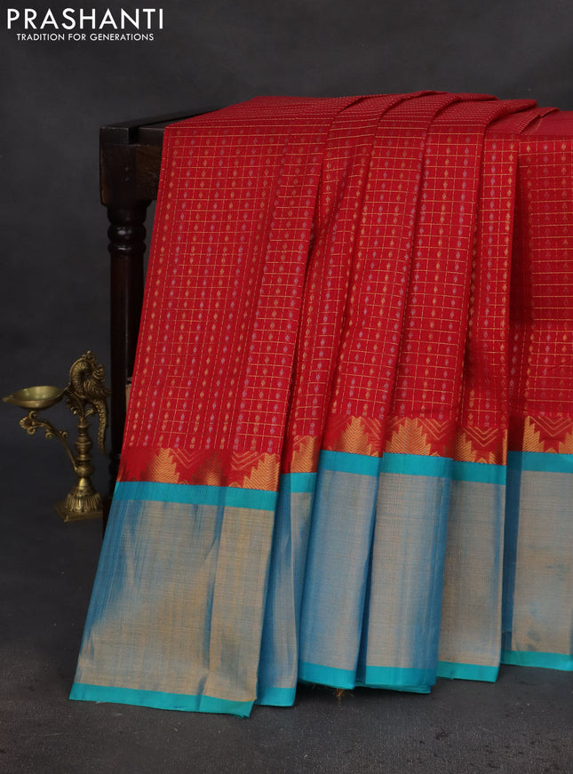 Kuppadam silk cotton saree red and teal blue with allover small zari checks & lakshadeepam weaves and temple design long zari woven border