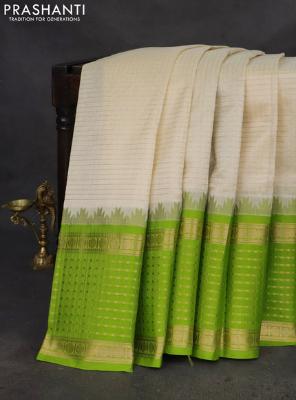 Kuppadam silk cotton saree cream and fluorescent green with allover small zari checks and temple design long zari woven butta border