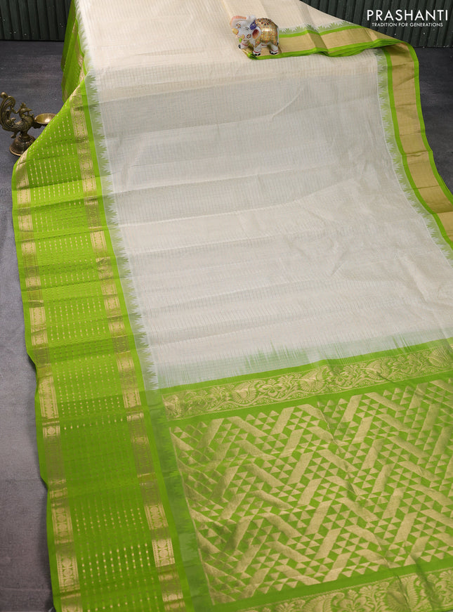 Kuppadam silk cotton saree cream and fluorescent green with allover small zari checks and temple design long zari woven butta border