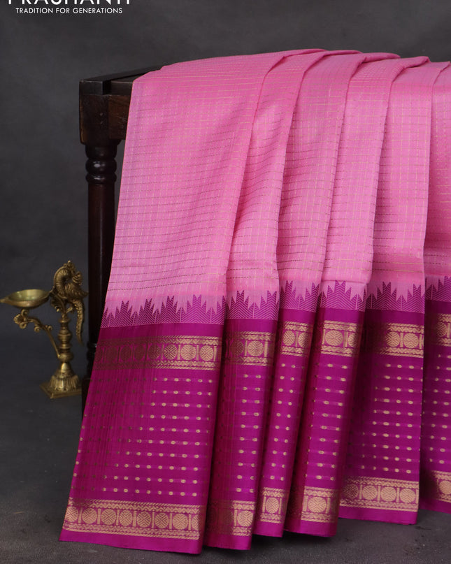 Kuppadam silk cotton saree light pink and purple with allover small zari checks and temple design long zari woven butta border