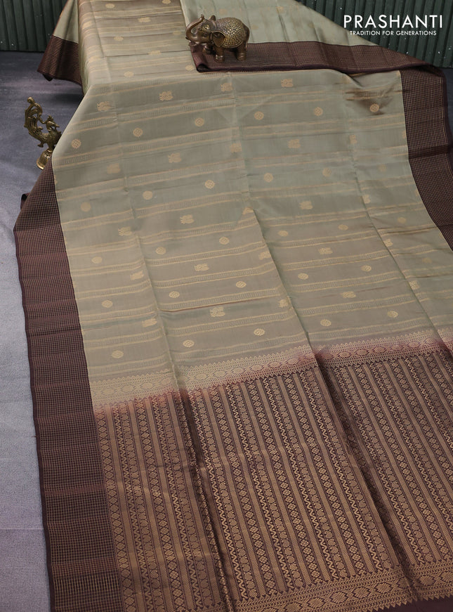 Kanchipuram soft silk saree elaichi green and coffee brown with allover zari weaves & buttas and zari woven checked border