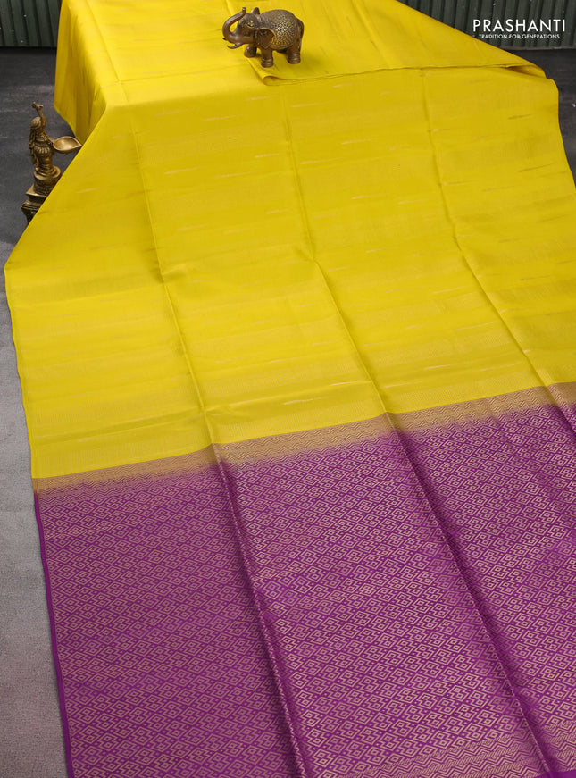 Kanchipuram soft silk saree yellow and purple with allover zari weaves & buttas in borderless style