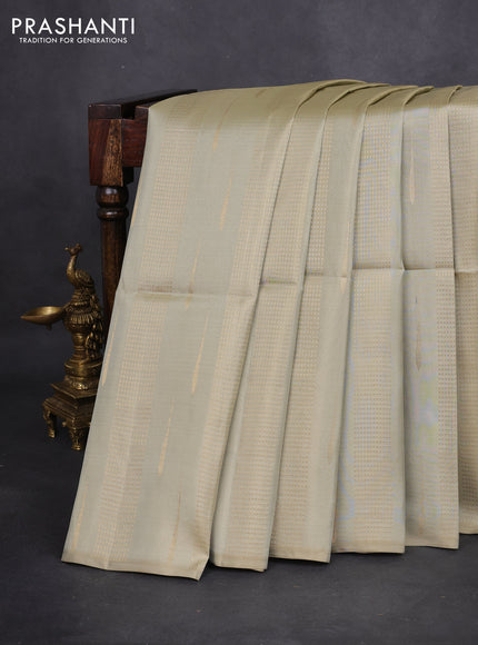 Kanchipuram soft silk saree elaichi green and purple with allover zari weaves & buttas in borderless style