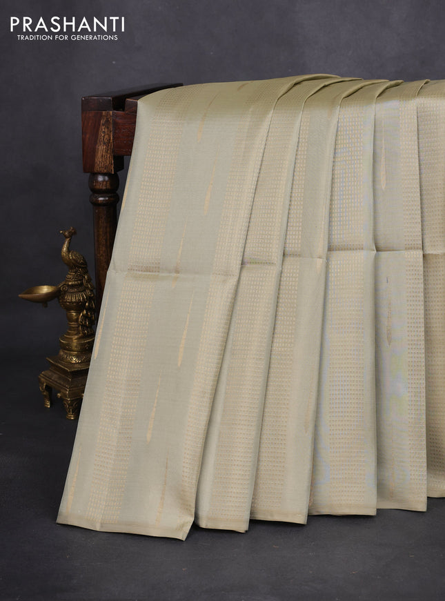 Kanchipuram soft silk saree elaichi green and purple with allover zari weaves & buttas in borderless style