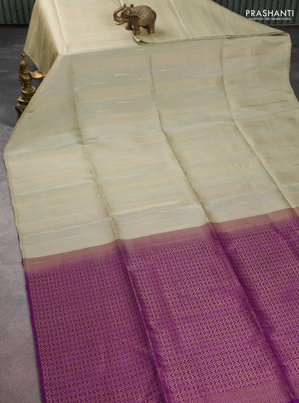 Kanchipuram soft silk saree elaichi green and purple with allover zari weaves & buttas in borderless style