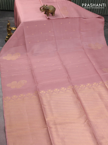 Kanchipuram soft silk saree pastel peach pink with zari woven buttas in borderless style