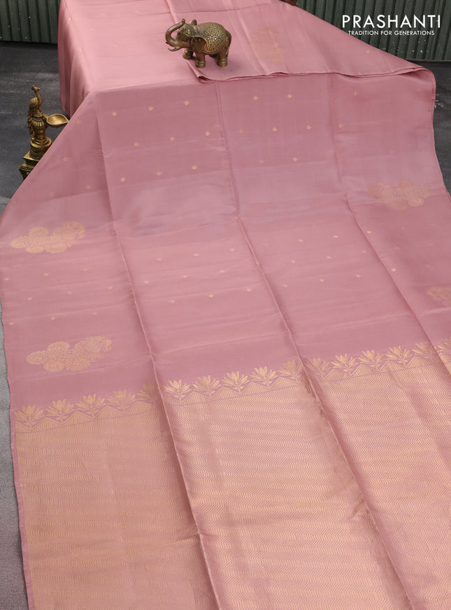 Kanchipuram soft silk saree pastel peach pink with zari woven buttas in borderless style