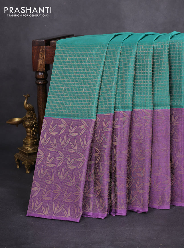 Kanchipuram soft silk saree teal green shade and lavender shade with allover zari woven brocade weaves and long zari woven border