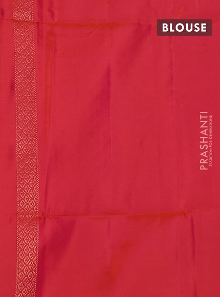 Kanchipuram soft silk saree dual shade of pinkish orange with zari woven buttas and long zari woven paisley butta border