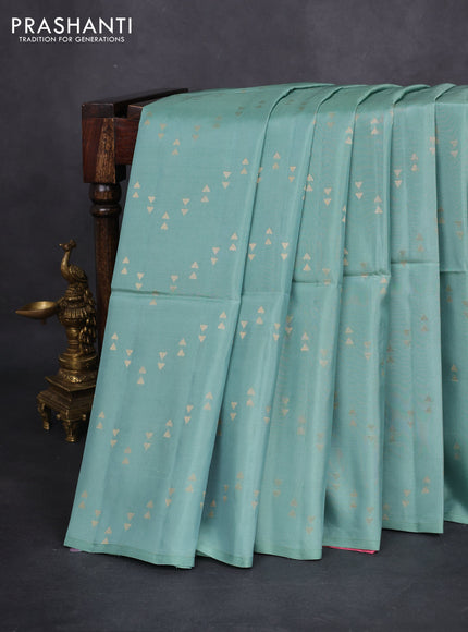 Kanchipuram soft silk saree pastel blue and candy pink with allover zari woven geometric buttas in borderless style