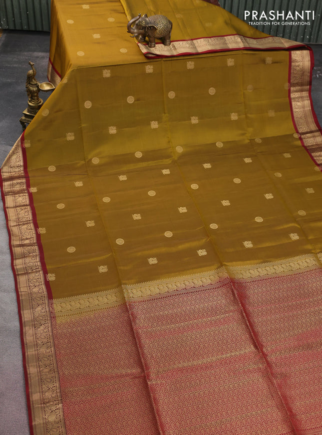 Kanchipuram soft silk saree dark mehendi green and maroon with annam & rudhraksha zari woven buttas and annam zari woven border