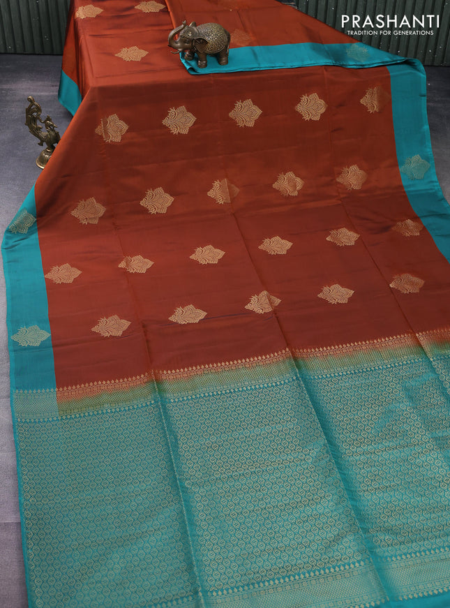 Kanchipuram soft silk saree rust shade and teal green with zari woven buttas and zari woven butta border