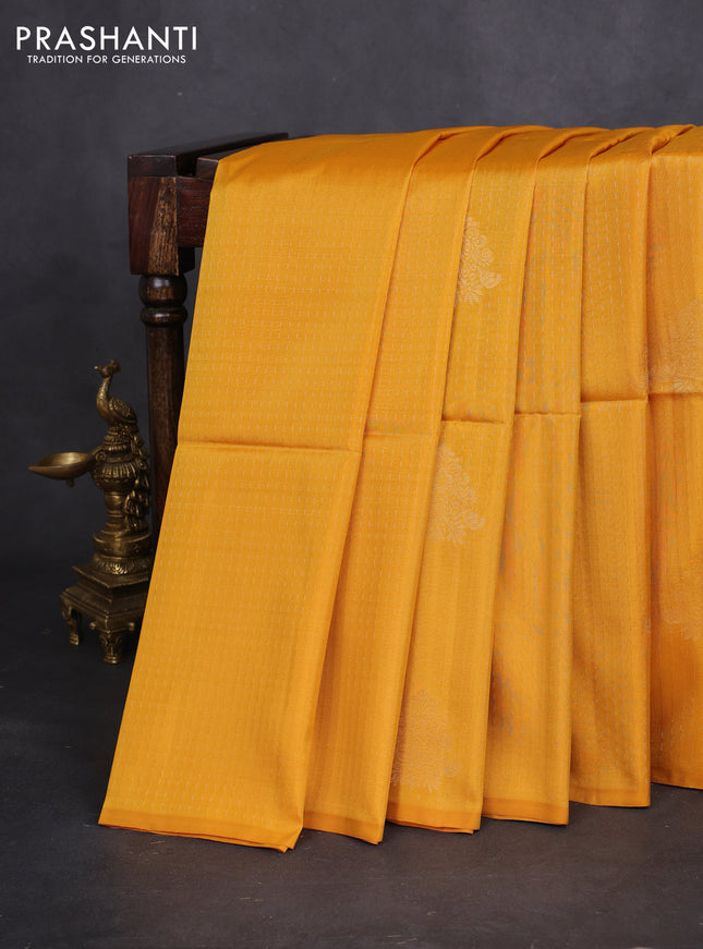 Kanchipuram soft silk saree yellow and dark green with allover zari weaves & buttas in borderless style