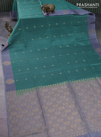 Kanchipuram soft silk saree teal green shade and grey with zari woven buttas and zari woven butta border
