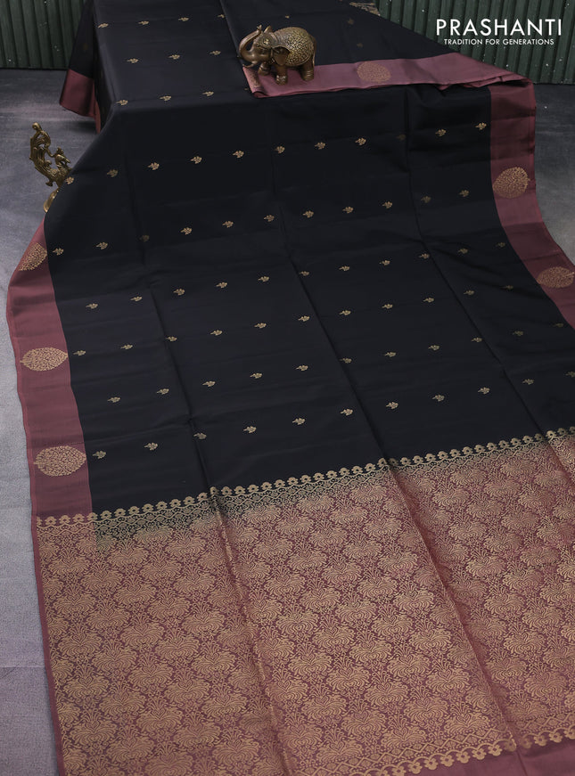 Kanchipuram soft silk saree black and pastel peach shade with zari woven buttas and zari woven butta border