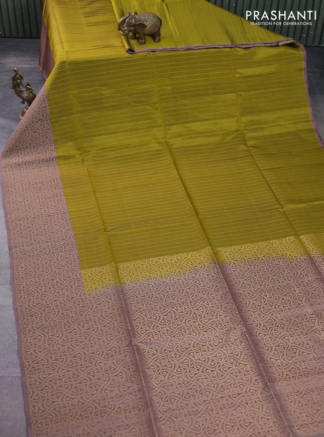 Kanchipuram soft silk saree mehendi green and pastel brown with allover zari stripe pattern and long rich zari woven border