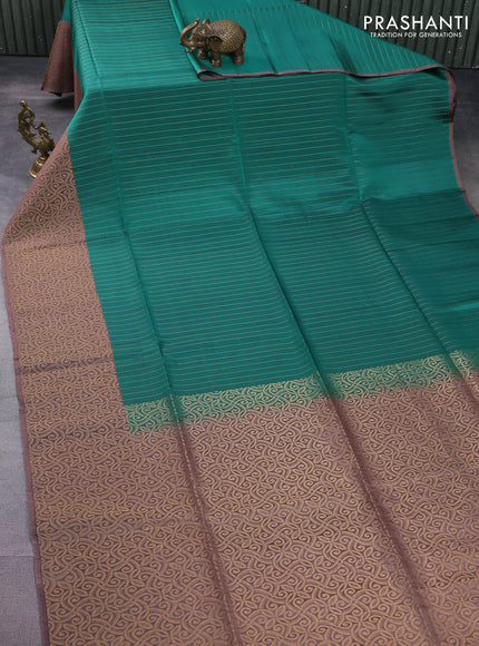 Kanchipuram soft silk saree teal green and pastel brown with allover zari stripe pattern and long rich zari woven border