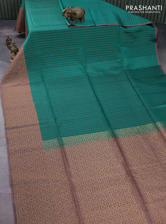 Kanchipuram soft silk saree teal green and pastel brown with allover zari stripe pattern and long rich zari woven border
