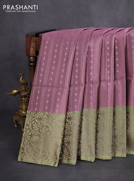 Kanchipuram soft silk saree pastel mauve pink and pastel green with allover zari weaves and long zari woven border