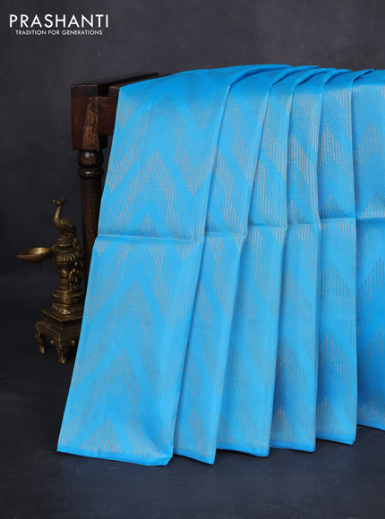 Kanchipuram soft silk saree light blue and coffee brown with allover zig zag zari weaves in borderless style