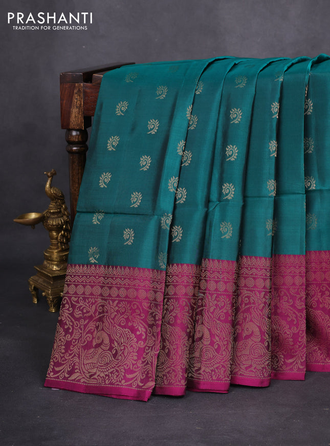 Kanchipuram soft silk saree peacock green and dark magenta pink with allover zari woven buttas and long zari woven border