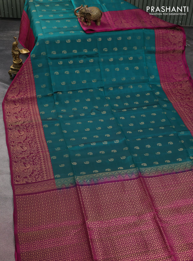 Kanchipuram soft silk saree peacock green and dark magenta pink with allover zari woven buttas and long zari woven border