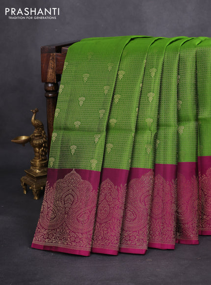 Kanchipuram soft silk saree green and dark magenta pink with allover zari woven brocdae weaves and long zari woven border