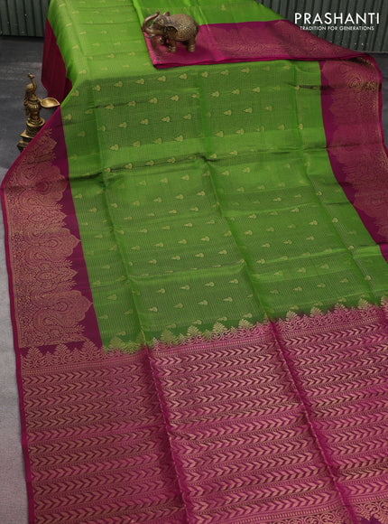 Kanchipuram soft silk saree green and dark magenta pink with allover zari woven brocdae weaves and long zari woven border